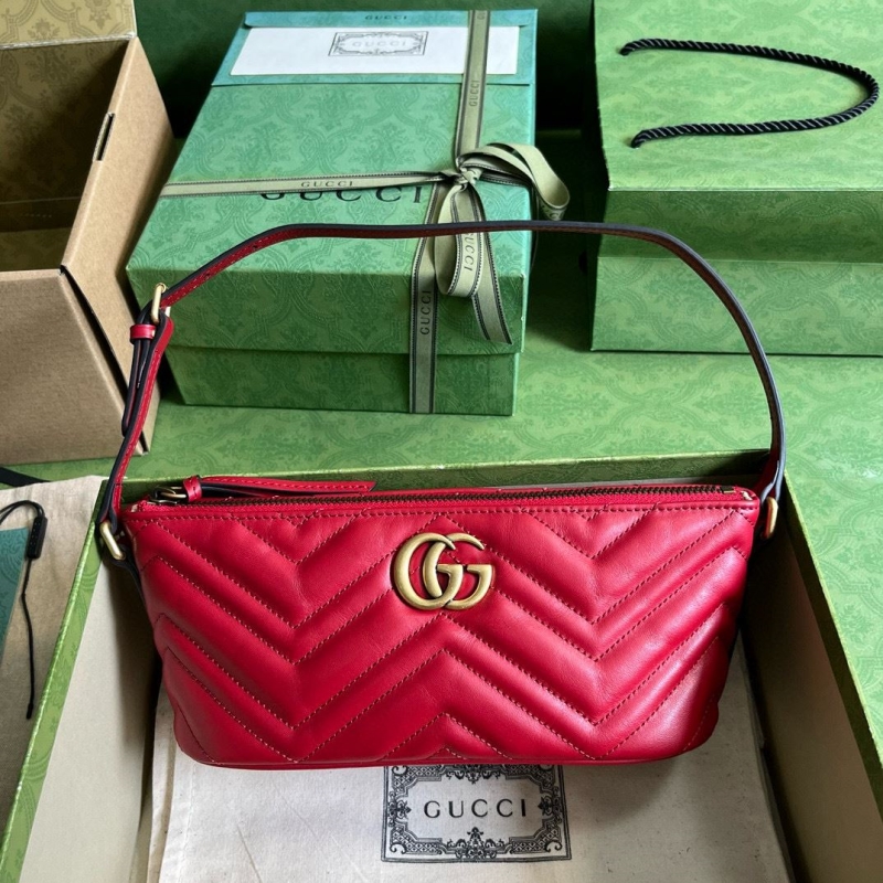G*u*i top handle bags